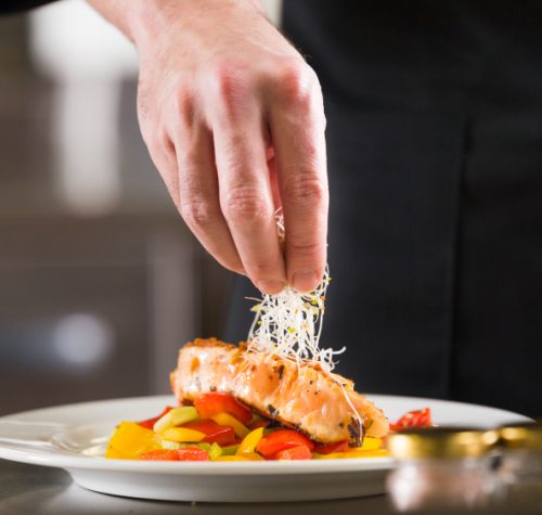 chef-preparing-a-dish-of-healthy-food